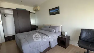 Modern bedroom with sleek furniture and cozy ambiance