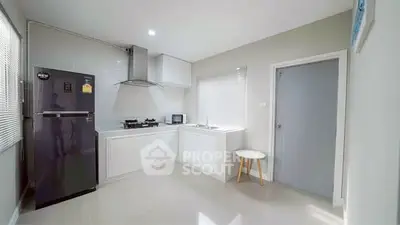 Modern kitchen with sleek appliances and open layout design