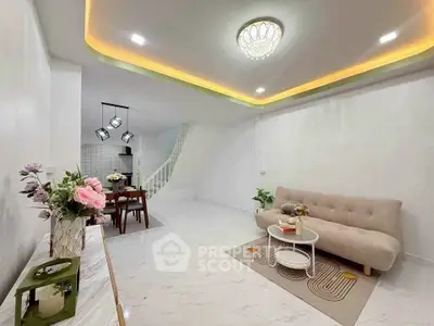 Spacious modern living room with elegant lighting and stylish decor