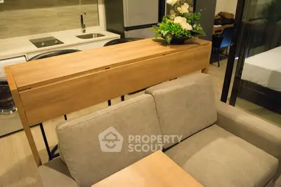 Modern apartment interior with stylish kitchen and cozy living area