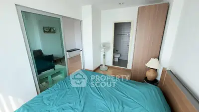 Cozy bedroom with ensuite bathroom and modern decor