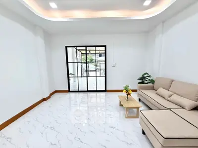 Modern living room with sleek design and marble flooring