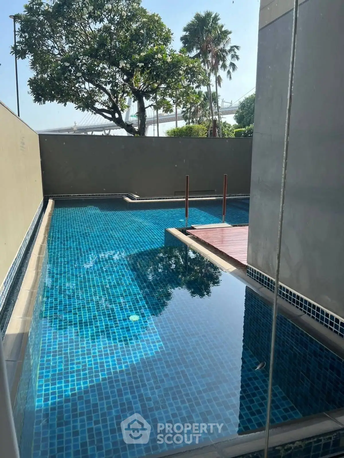 Luxurious private pool with modern design and serene surroundings, perfect for relaxation and leisure.