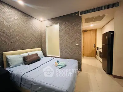 Modern bedroom with stylish decor and in-room laundry facilities
