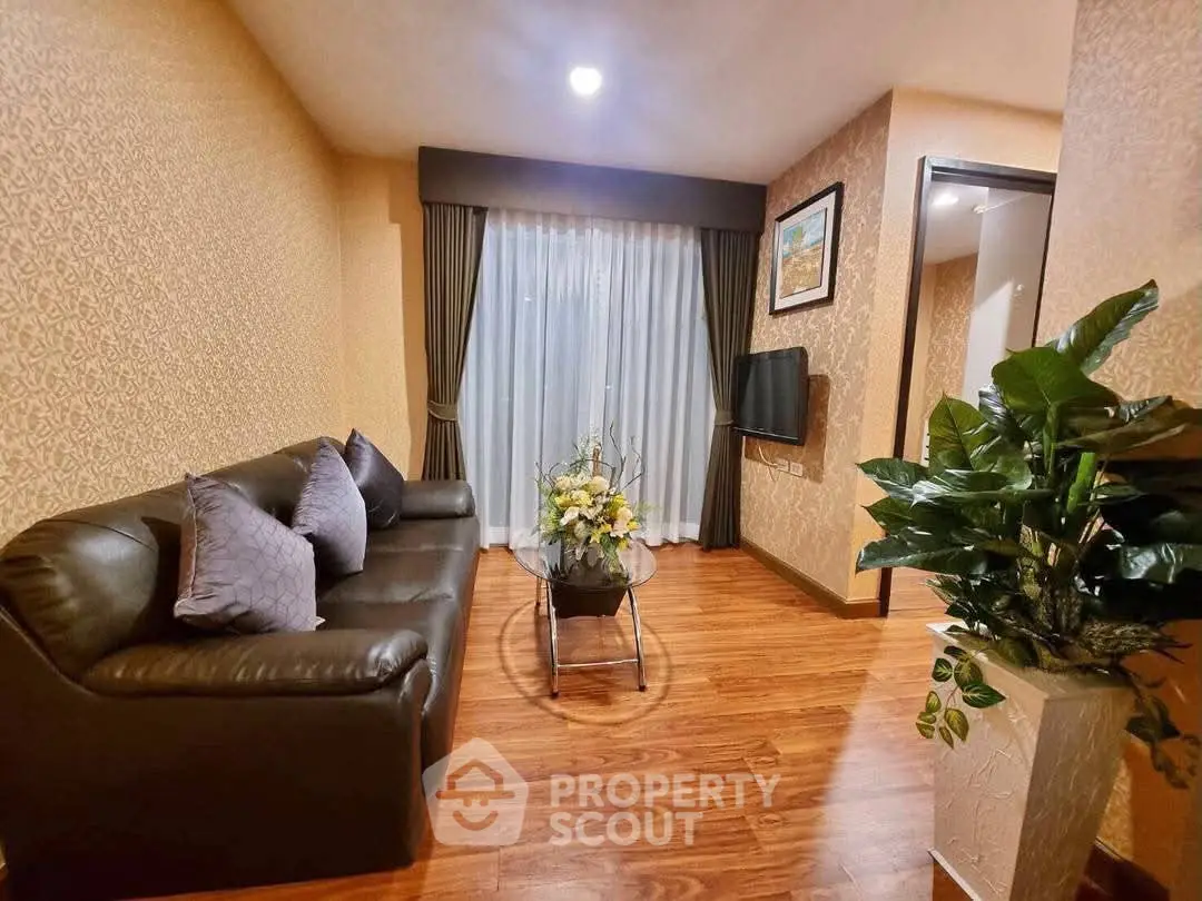 Cozy living room with elegant decor and hardwood flooring