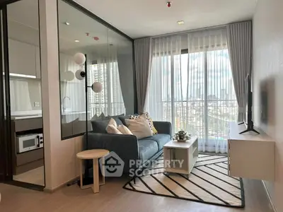Modern living room with city view, stylish decor, and natural light
