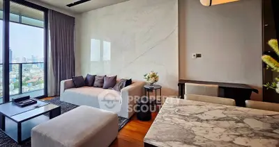 Luxurious modern living room with city view, marble accents, and elegant furnishings in high-rise apartment.