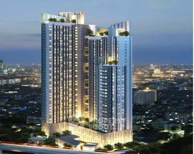 Stunning high-rise building with cityscape view, modern architecture, and illuminated facade at dusk.