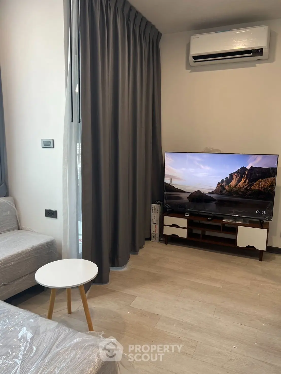 Modern living room with sleek design and air conditioning