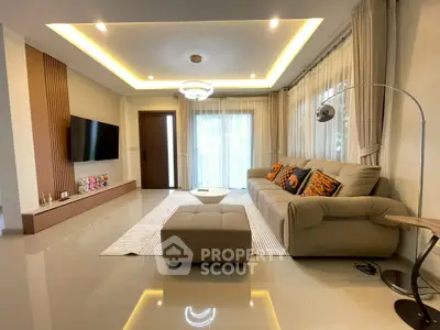 Modern living room with elegant lighting and stylish furniture