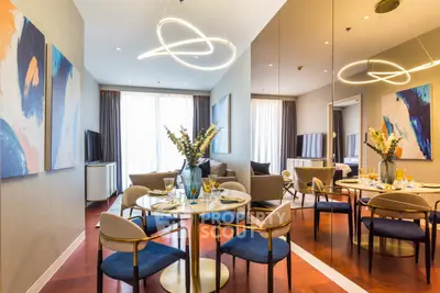 Luxurious modern living room with elegant dining area and stylish decor