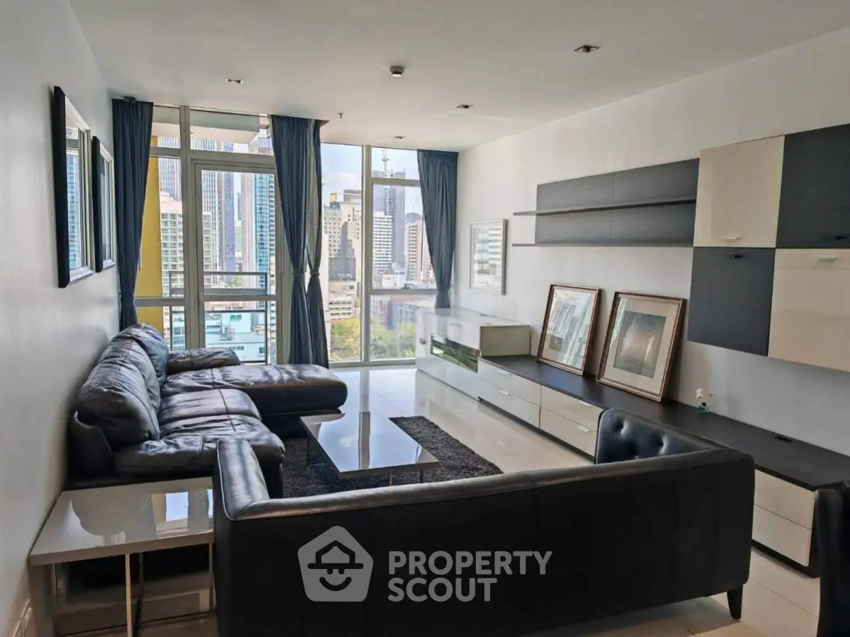 Spacious modern living room with city view and stylish furniture