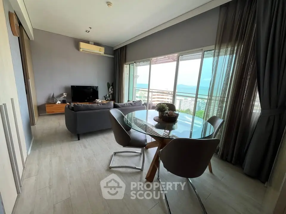 Spacious living room with stunning ocean view and modern decor