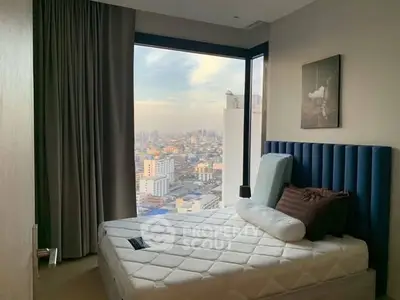 Luxurious bedroom with stunning city view and modern decor