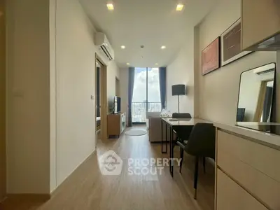 Modern living room with balcony view in high-rise apartment