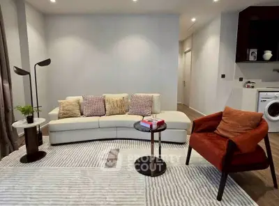 Stylish modern living room with cozy seating and elegant decor