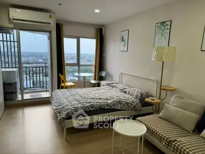 Modern bedroom with balcony and city view, featuring stylish decor and natural light.
