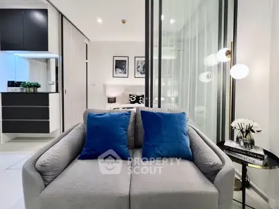 Modern living room with stylish decor and cozy sofa in luxury apartment