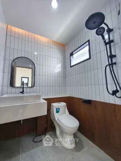 Modern bathroom with sleek fixtures and stylish tile design