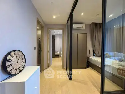 Modern bedroom with glass partition and stylish decor