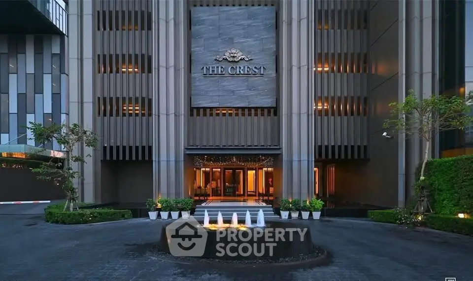 Luxurious entrance of The Crest with elegant facade and fountain