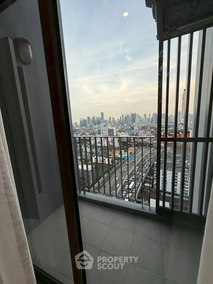 Stunning cityscape view from a high-rise balcony, perfect for urban living enthusiasts.