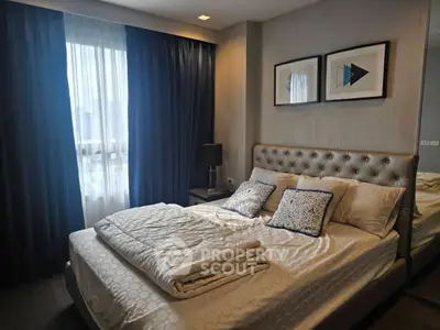 Luxurious bedroom with elegant decor and plush bedding in modern apartment