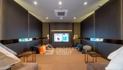 Luxurious home theater room with plush seating and ambient lighting