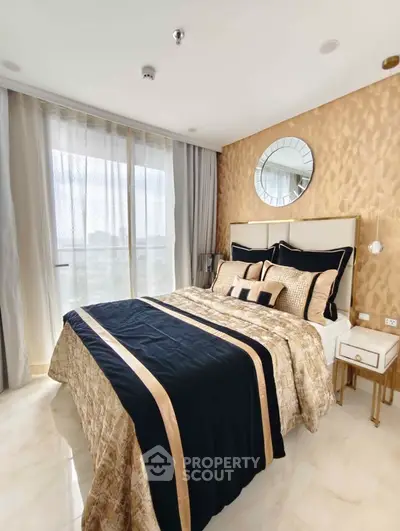 Luxurious bedroom with elegant decor and large window for natural light