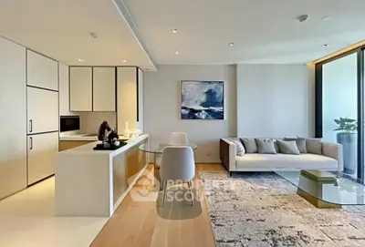 Modern living room with open kitchen, stylish decor, and large windows for natural light.