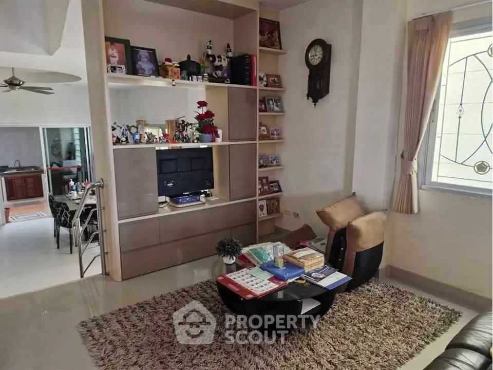 Cozy living room with modern decor and open layout, perfect for relaxation and entertainment.