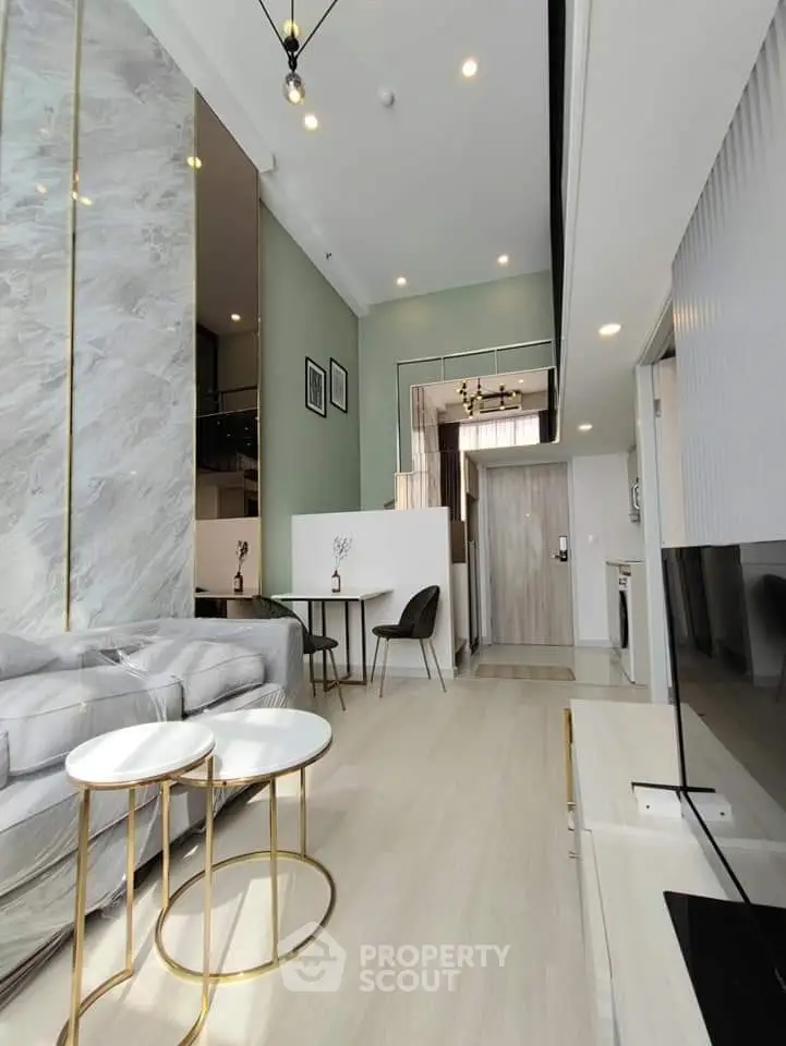 Luxurious modern living room with high ceilings and elegant decor