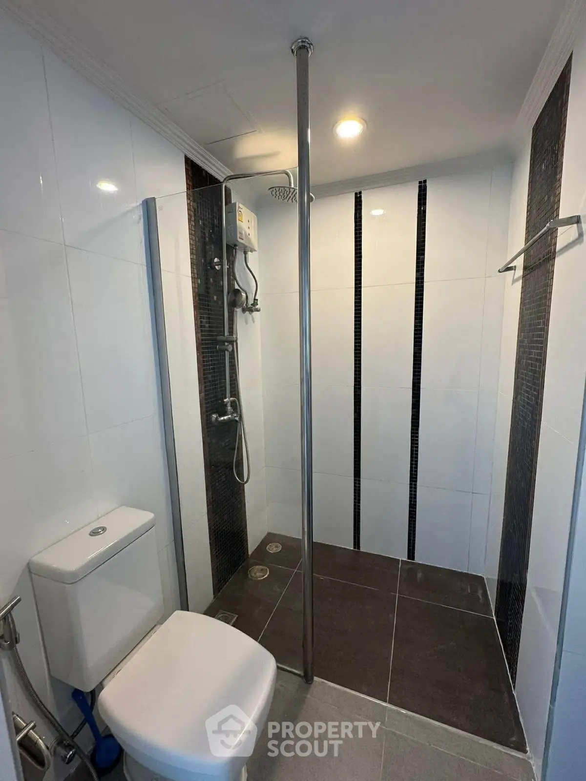 Modern bathroom with sleek shower design and elegant tile work