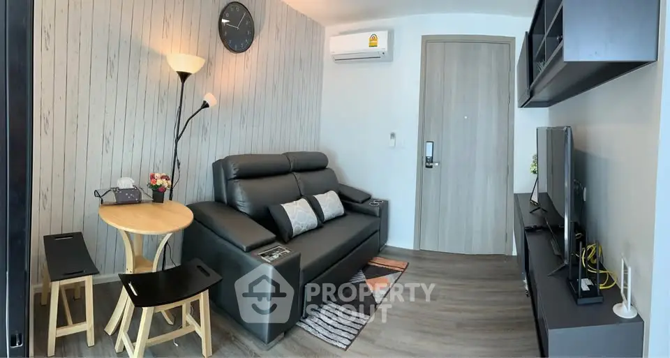 Cozy living room with modern decor and comfortable seating