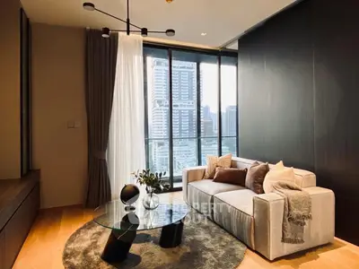 Modern living room with city view, stylish furniture, and floor-to-ceiling windows in urban apartment.