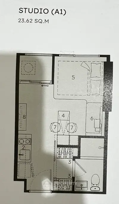 Compact studio apartment floor plan with efficient layout and modern amenities.