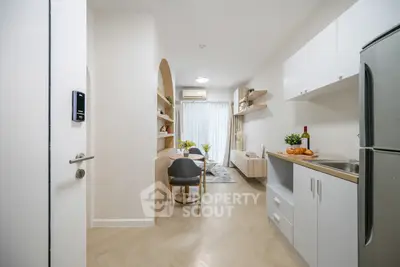 Modern open-plan kitchen and dining area with sleek design and natural light.