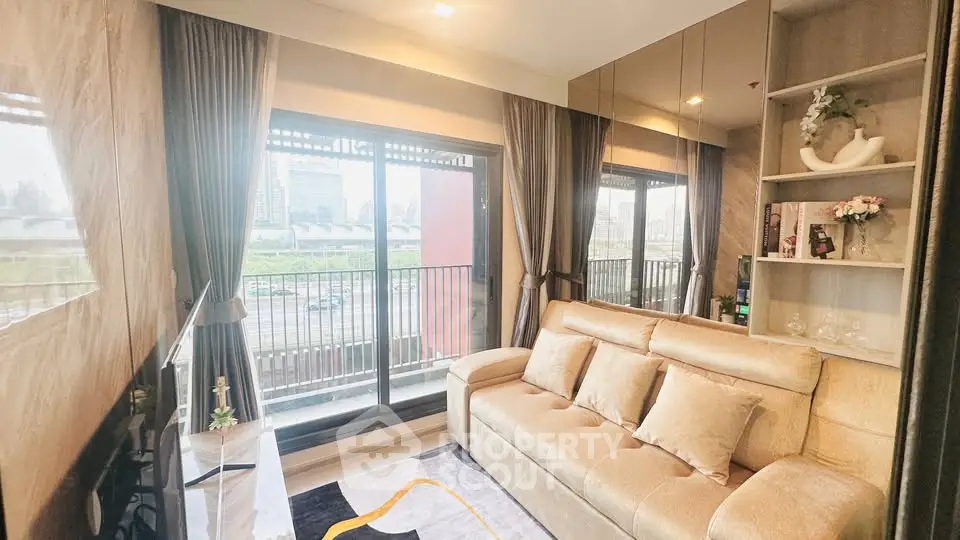 Luxurious living room with plush sofa and city view balcony in modern apartment