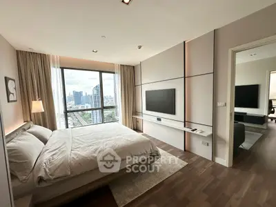 Luxurious bedroom with stunning city view and modern decor