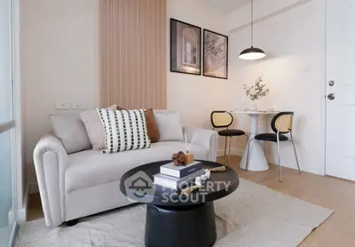 Chic modern living room with cozy sofa and stylish decor, perfect for urban living.