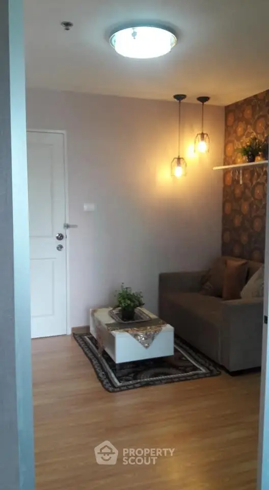 Cozy living room with modern lighting and stylish decor