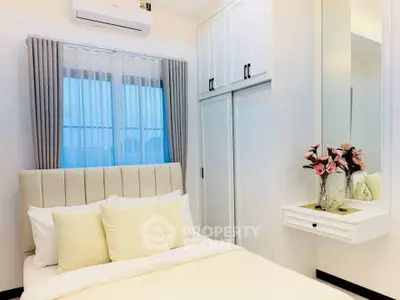 Cozy modern bedroom with elegant decor and ample storage space