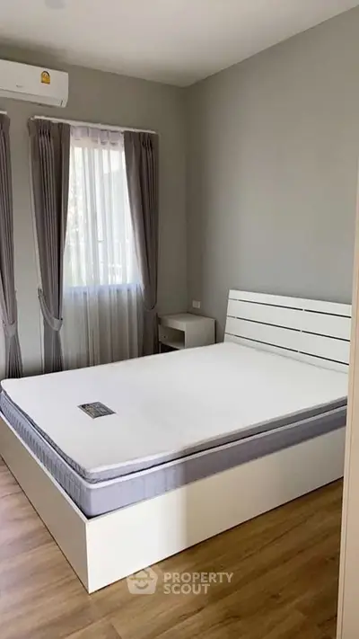 Modern bedroom with minimalist design and natural light