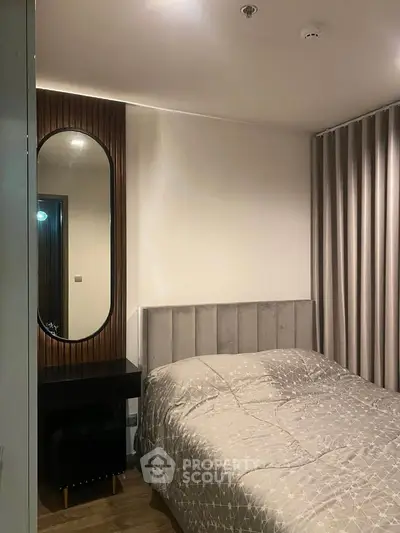 Cozy modern bedroom with elegant decor and plush bedding