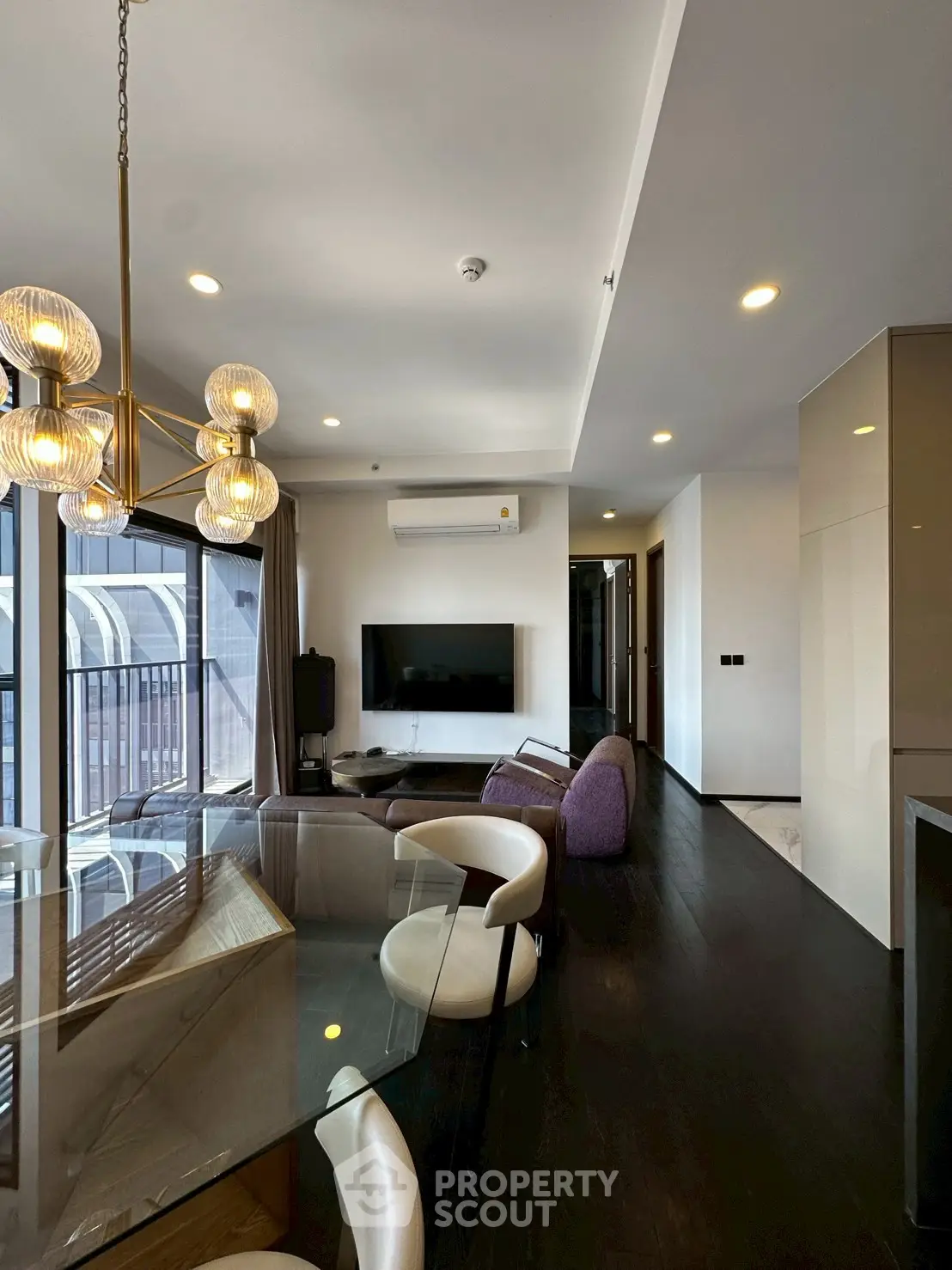 Luxurious modern living room with elegant lighting and large windows