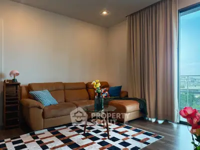 Stylish living room with leather sofa and city view balcony, perfect for modern urban living.