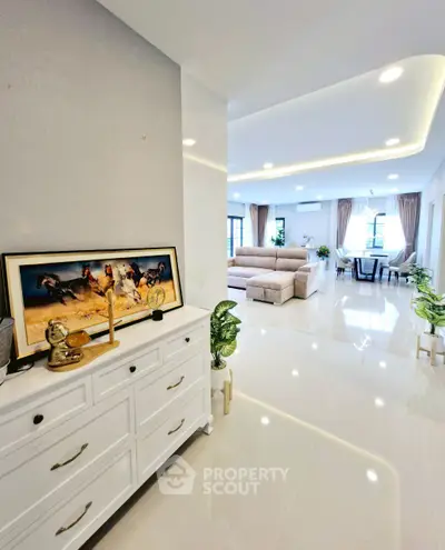 Spacious modern living room with elegant decor and ample natural light