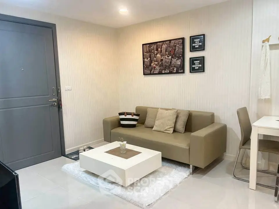 Modern living room with stylish decor and comfortable seating in a cozy apartment.