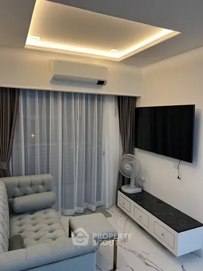 Modern living room with sleek furniture and ambient lighting