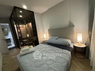 Modern bedroom with cozy lighting and walk-in closet